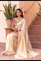 Imperial Ivory Silk Saree with Red Hand-Embroidered Blouse